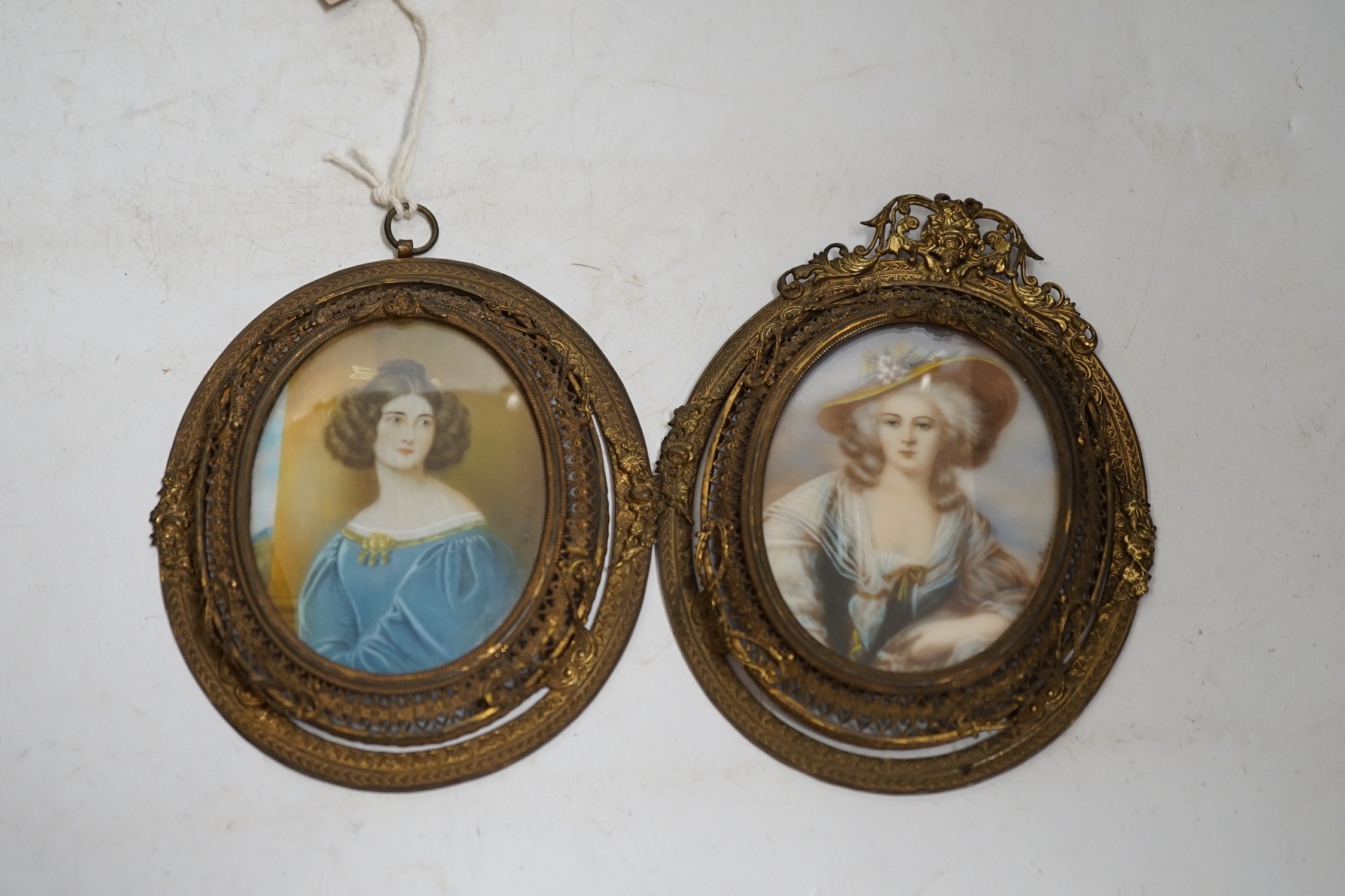 J Steiler, miniature on ivory, portrait of Anna R Kaula, and another Le Beau, c.1900, in pierced gilt-metal frames. CITES Submission references G2TXJBBQ & Submission reference MS6J4TYA. Condition - fair